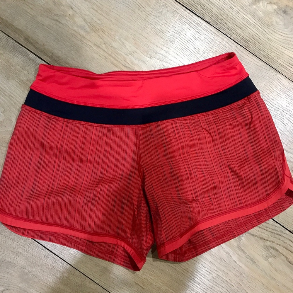 Red Lululemon running shorts
